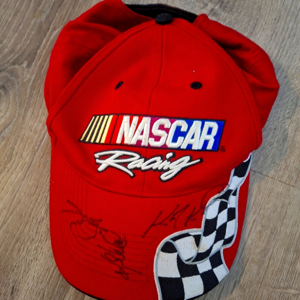 Autographed Nascar racing cap with signatures Kasey Kahne is one.